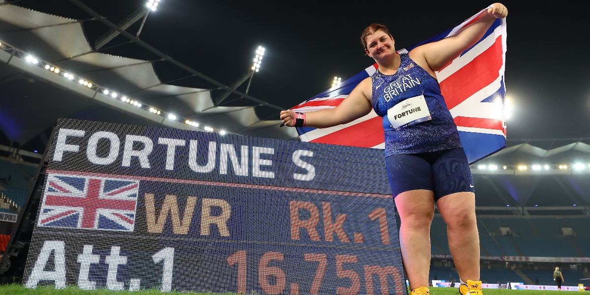 Fortune sets new world record as Woods takes bronze